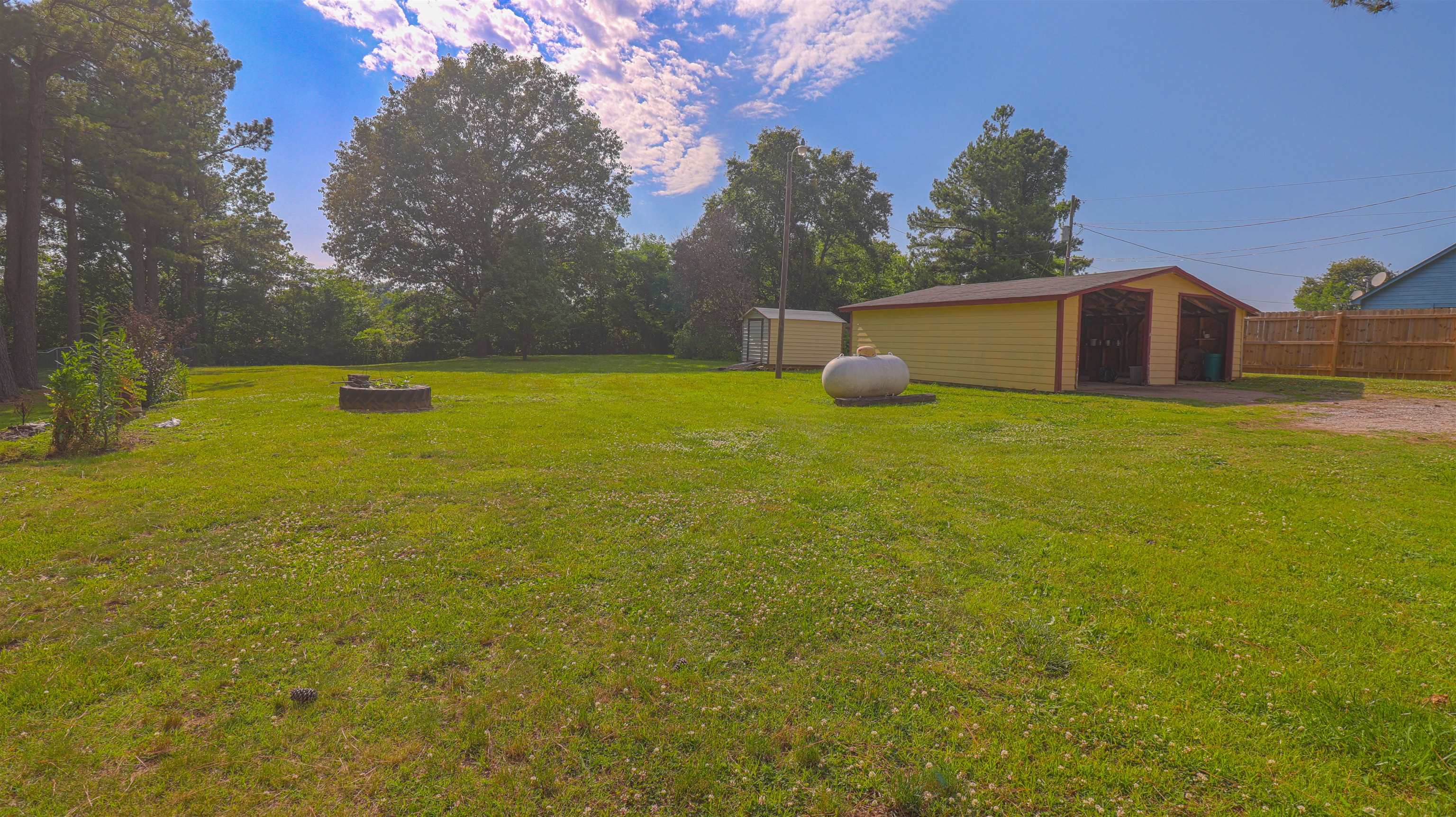 1675 Tabernacle Road Covington, TN 38019 - Photo 21 of 21 a view of a house with a yard
