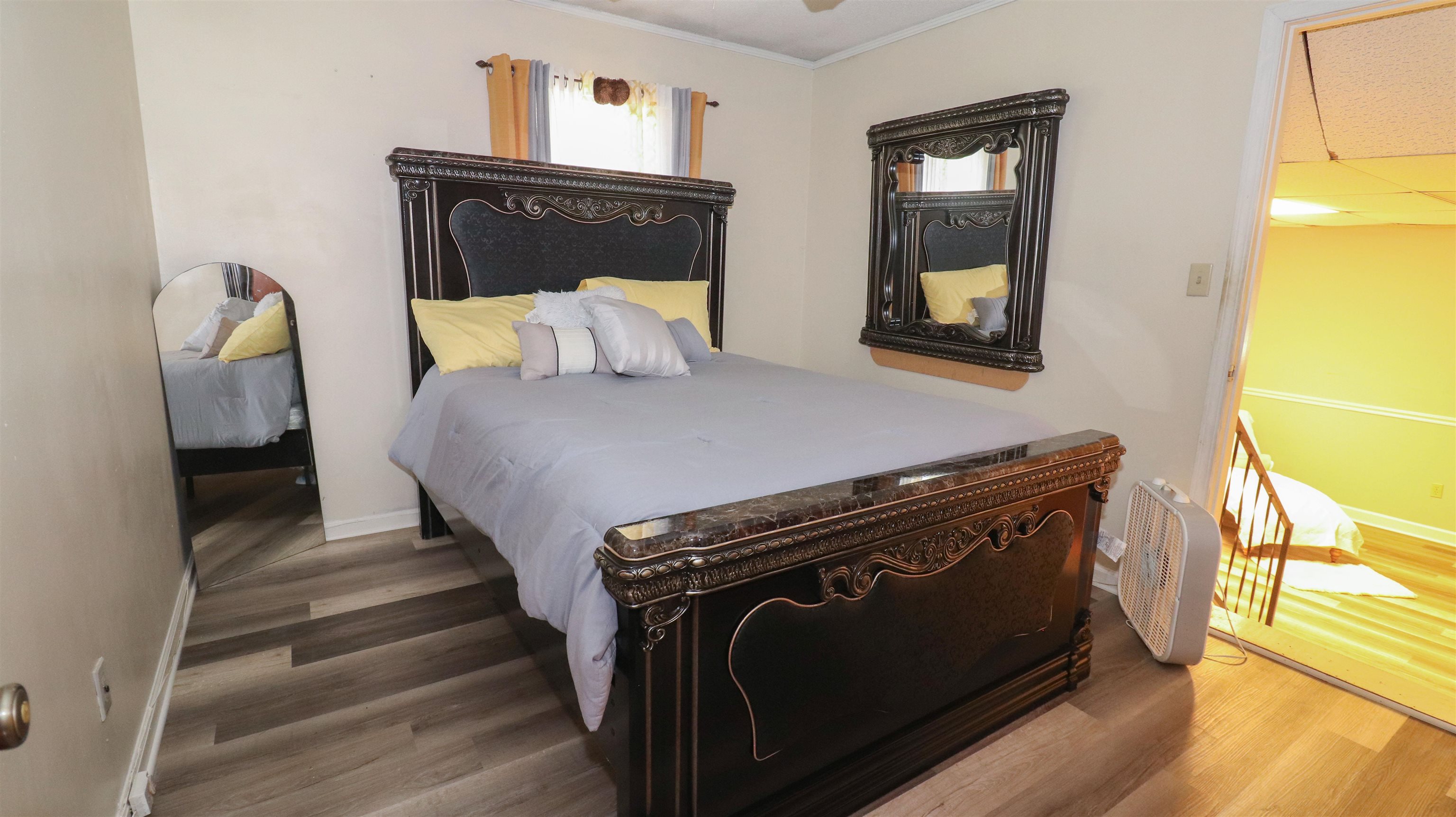 1675 Tabernacle Road Covington, TN 38019 - Photo 10 of 21 a bedroom with a bed and windows