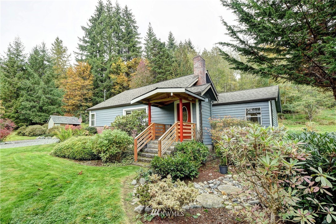 3625 Newberg Road Snohomish, WA 98290 - Photo 1 of 25 a front view of a house with garden