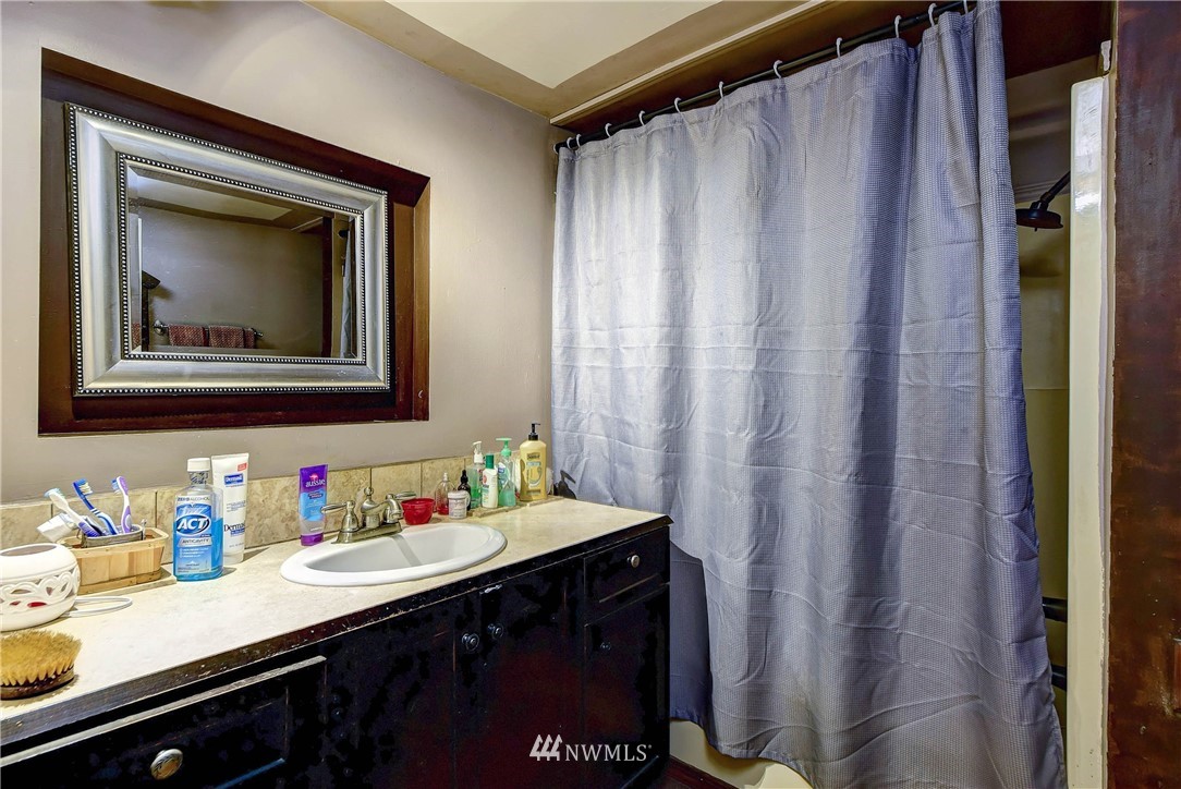 3625 Newberg Road Snohomish, WA 98290 - Photo 13 of 25 a bathroom with a sink and a mirror