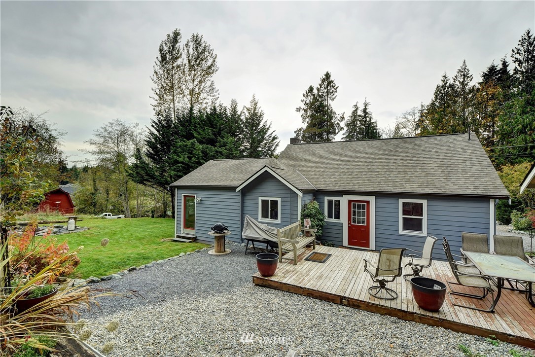 3625 Newberg Road Snohomish, WA 98290 - Photo 20 of 25 a view of a house with backyard and sitting area