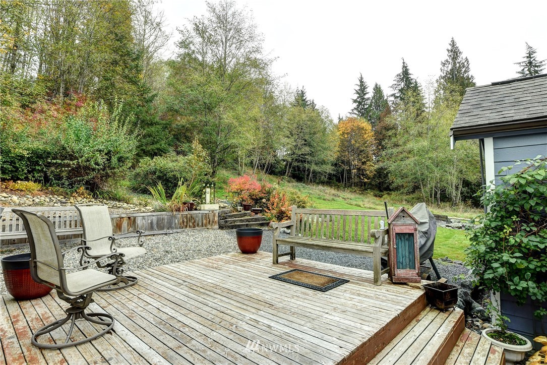 3625 Newberg Road Snohomish, WA 98290 - Photo 21 of 25 a view of backyard with seating space and trees