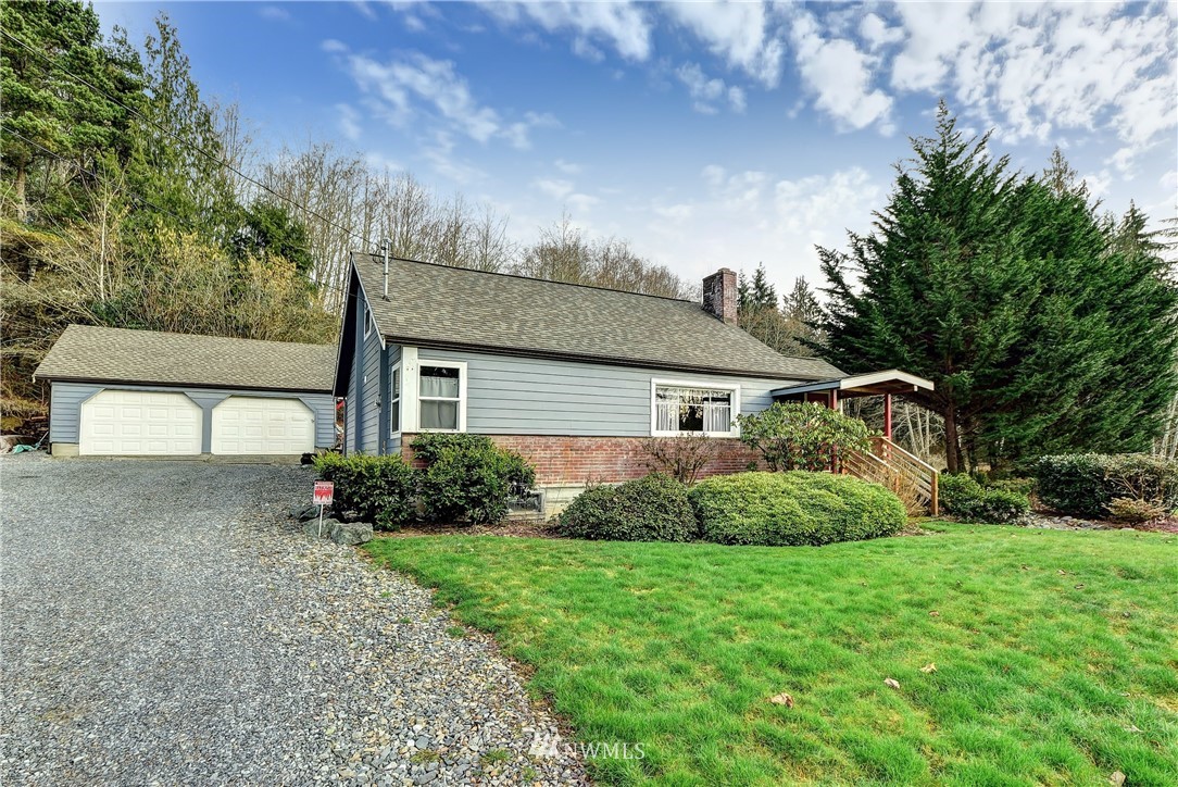 3625 Newberg Road Snohomish, WA 98290 - Photo 22 of 25 a front view of a house with garden