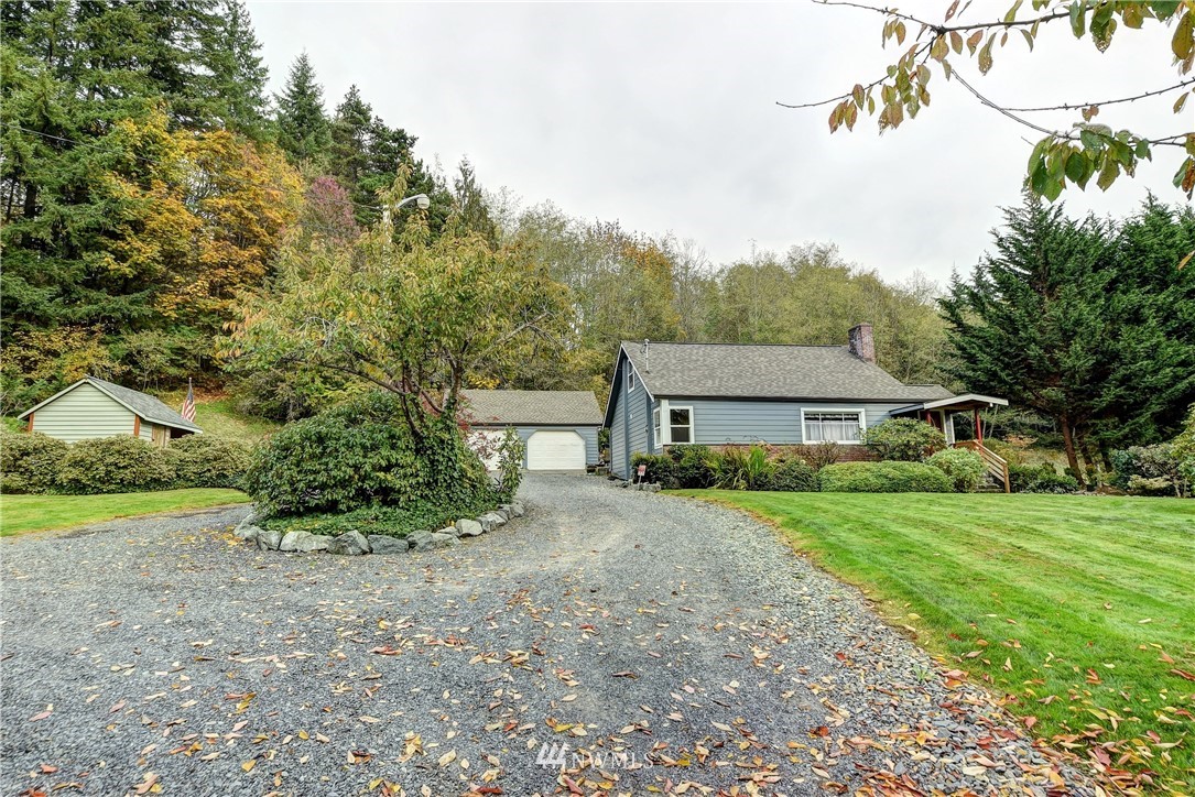 3625 Newberg Road Snohomish, WA 98290 - Photo 23 of 25 a view of a house with a yard and large trees
