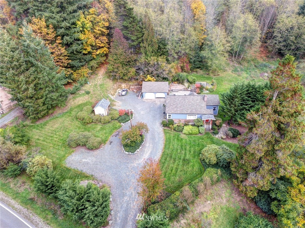3625 Newberg Road Snohomish, WA 98290 - Photo 24 of 25 an aerial view of a house with a yard and lake