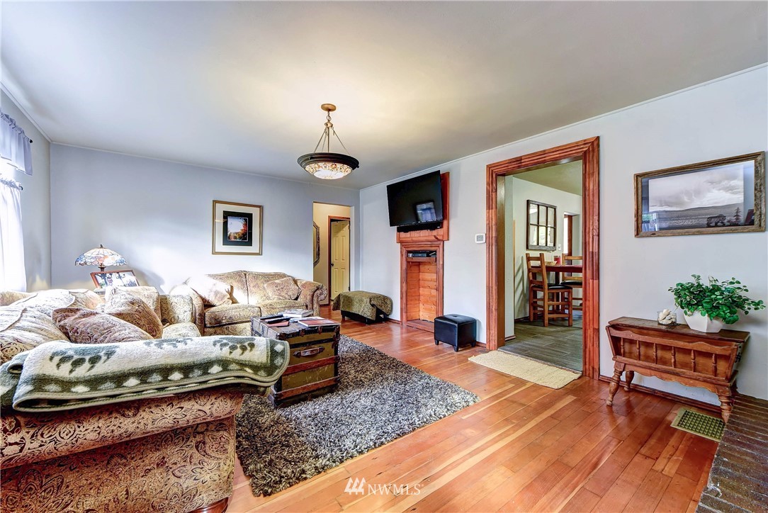 3625 Newberg Road Snohomish, WA 98290 - Photo 7 of 25 a living room with furniture and wooden floor