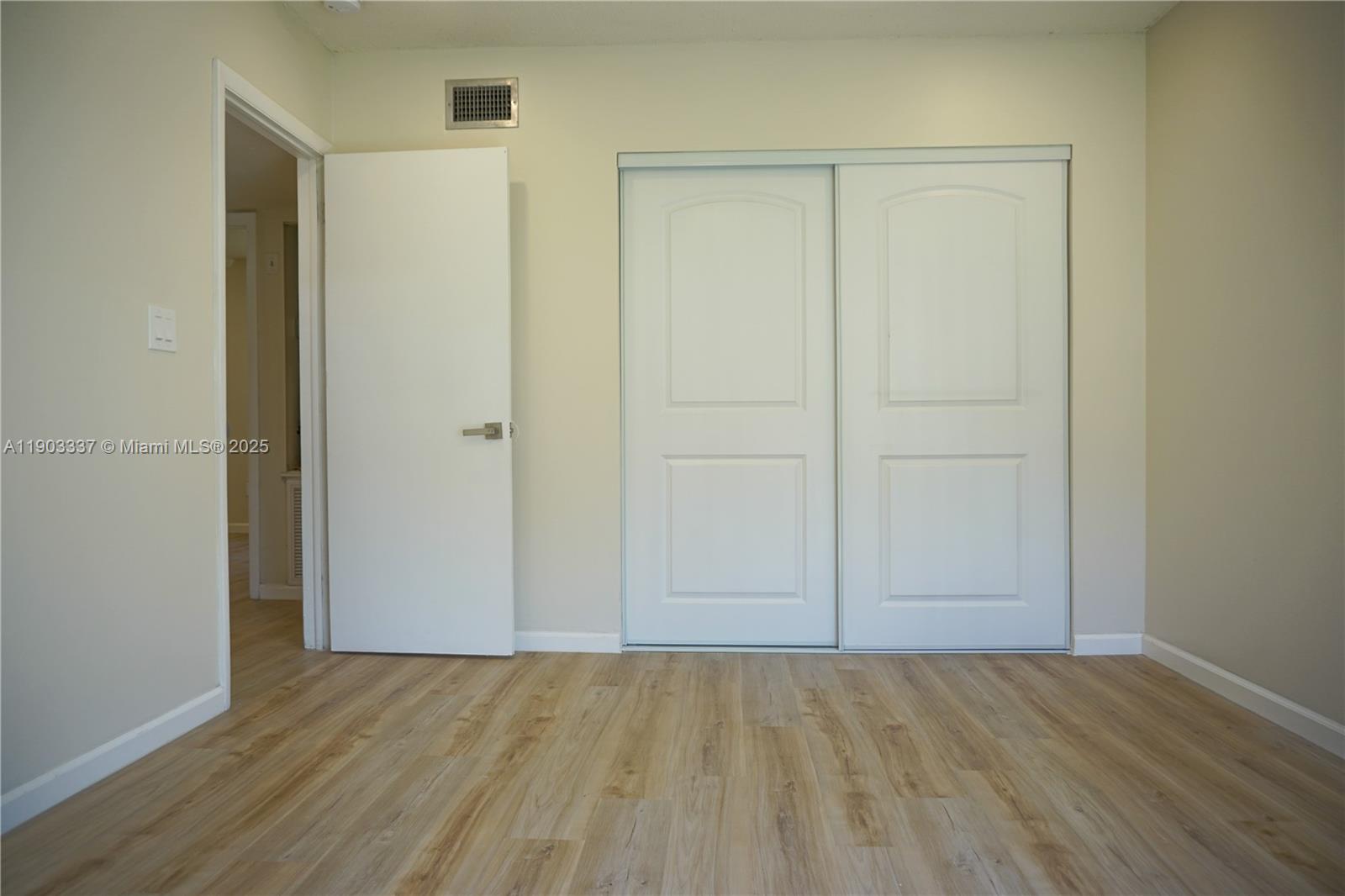 971 Fulton Lane Northeast Palm Bay, FL 32905 - Photo 21 of 29 a view of an empty room