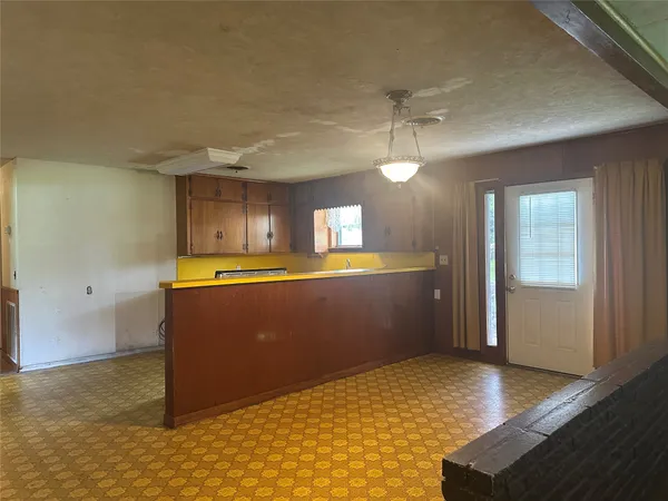 a view of kitchen and a window