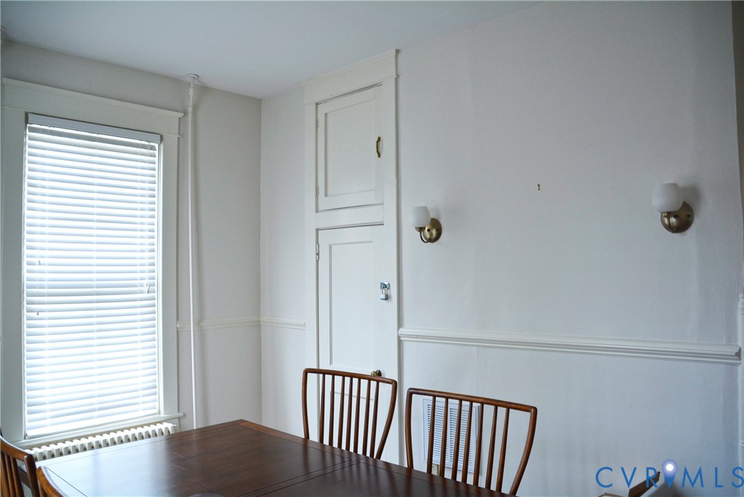 900 High Street Farmville, VA 23901 - Photo 14 of 24 White walls with chair rail molding and two brass