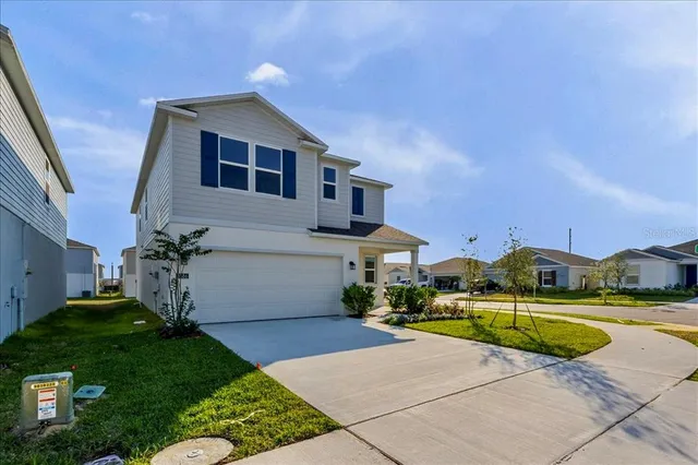 a view of a house with a swimming pool
