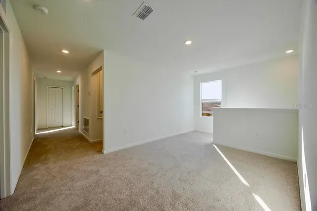 an empty room with a bathroom