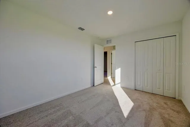 a view of a room with an entryway