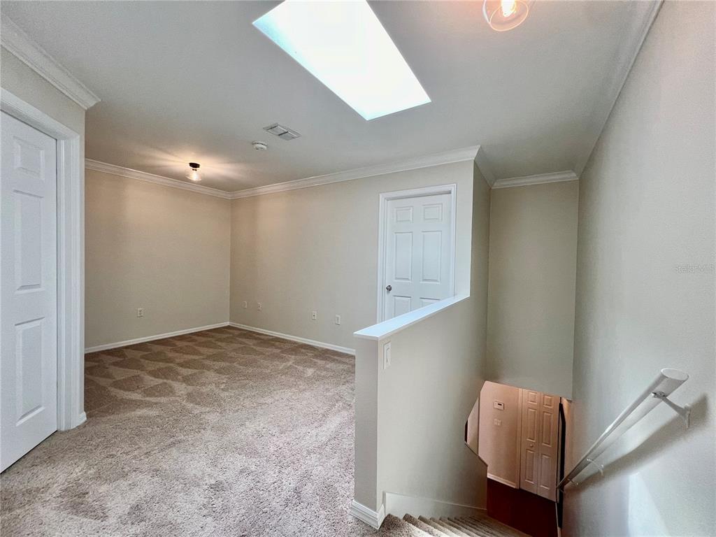 2513 West Kansas Avenue, Unit B Tampa, FL 33629 - Photo 15 of 27 a view of livingroom with furniture and wooden floor
