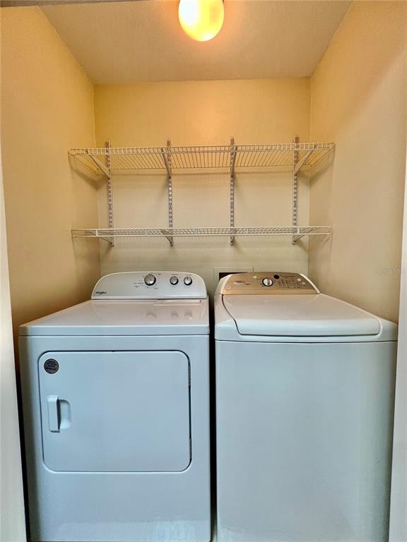 2513 West Kansas Avenue, Unit B Tampa, FL 33629 - Photo 19 of 27 a utility room with dryer and washer