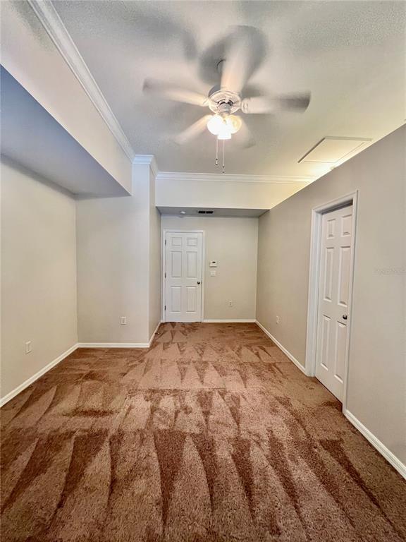 2513 West Kansas Avenue, Unit B Tampa, FL 33629 - Photo 22 of 27 a view of a room with a ceiling fan