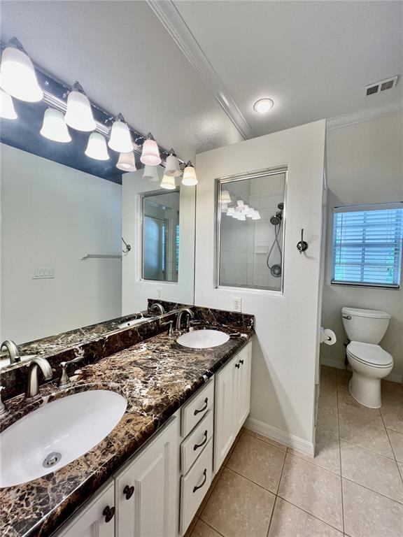 2513 West Kansas Avenue, Unit B Tampa, FL 33629 - Photo 23 of 27 a bathroom with a granite countertop sink and a mirror