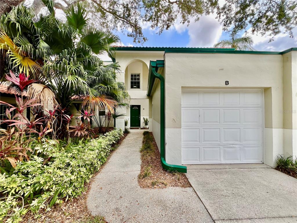 2513 West Kansas Avenue, Unit B Tampa, FL 33629 - Photo 3 of 27 a front view of a house with a yard