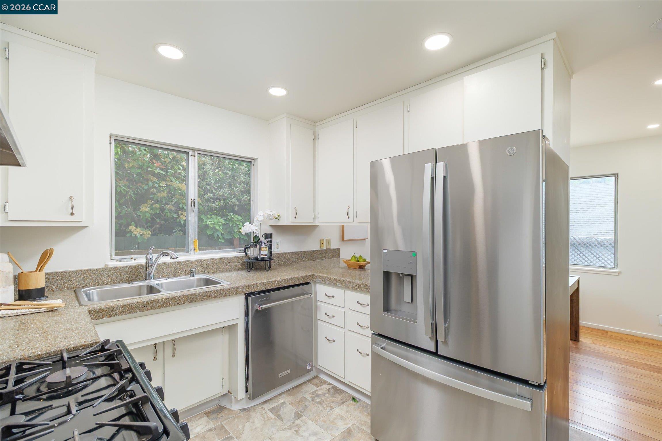 315 Forbes Avenue San Rafael, CA 94901 - Photo 12 of 28 a kitchen with a sink stove and refrigerator