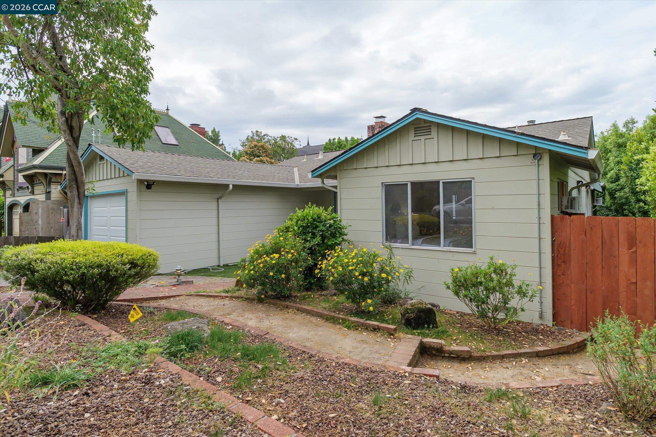315 Forbes Avenue San Rafael, CA 94901 - Photo 2 of 28 a front view of a house with garden