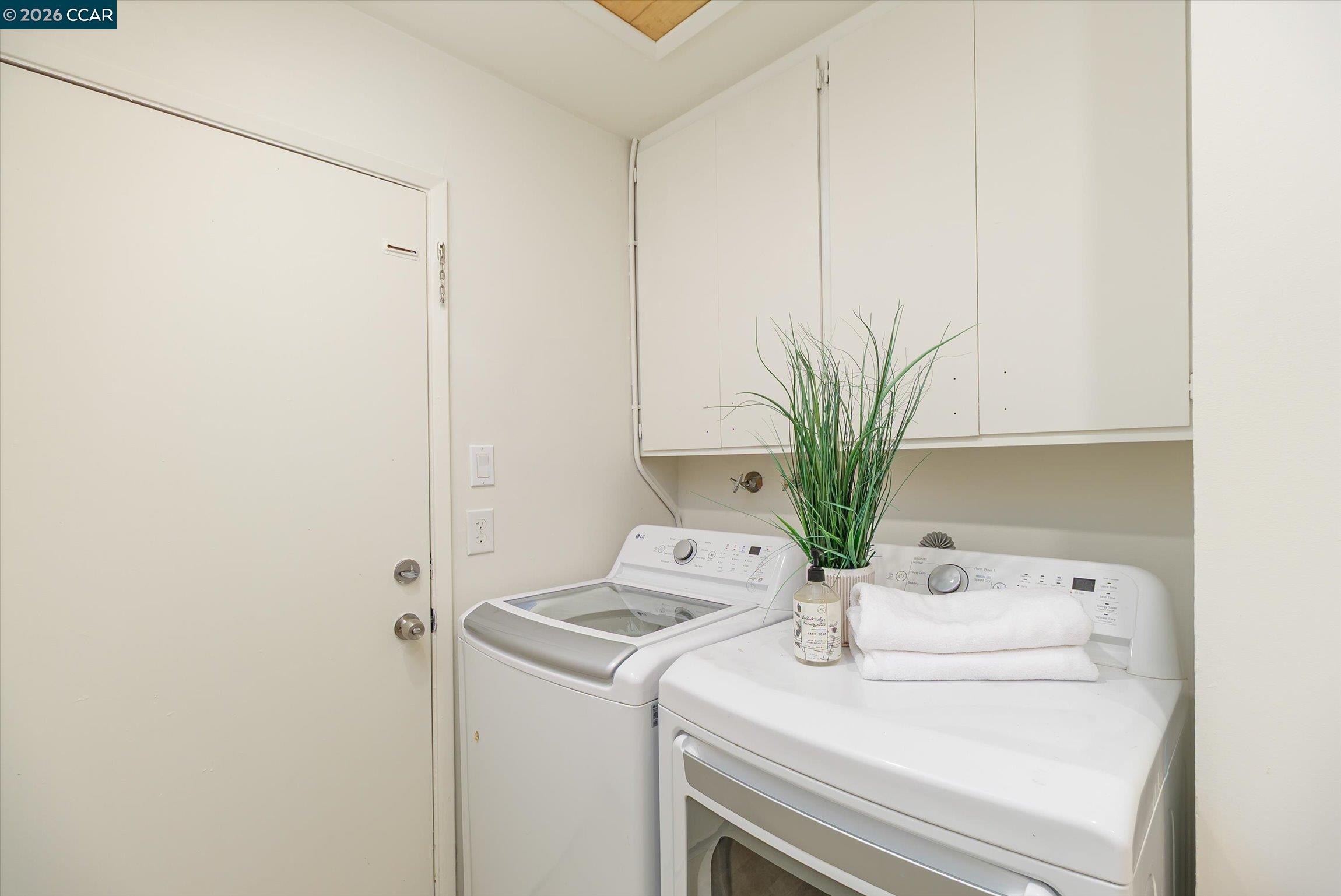 315 Forbes Avenue San Rafael, CA 94901 - Photo 23 of 28 a bathroom with a sink a mirror and a potted plant