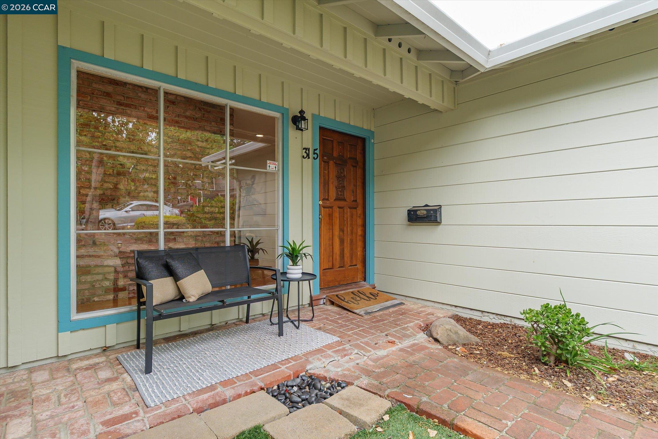 315 Forbes Avenue San Rafael, CA 94901 - Photo 4 of 28 a outdoor living space with patio furniture and potted plants