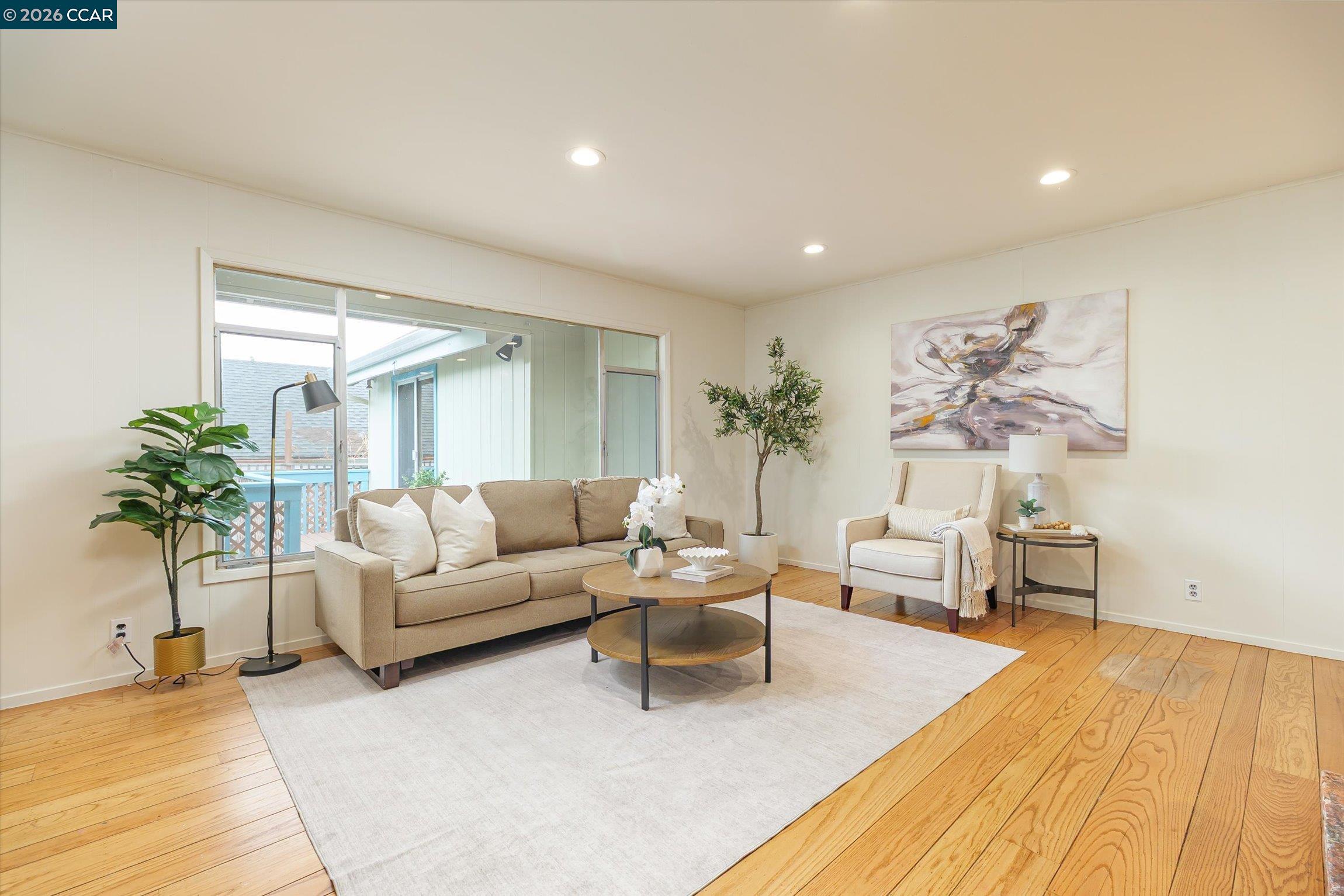 315 Forbes Avenue San Rafael, CA 94901 - Photo 6 of 28 a living room with furniture and a couch