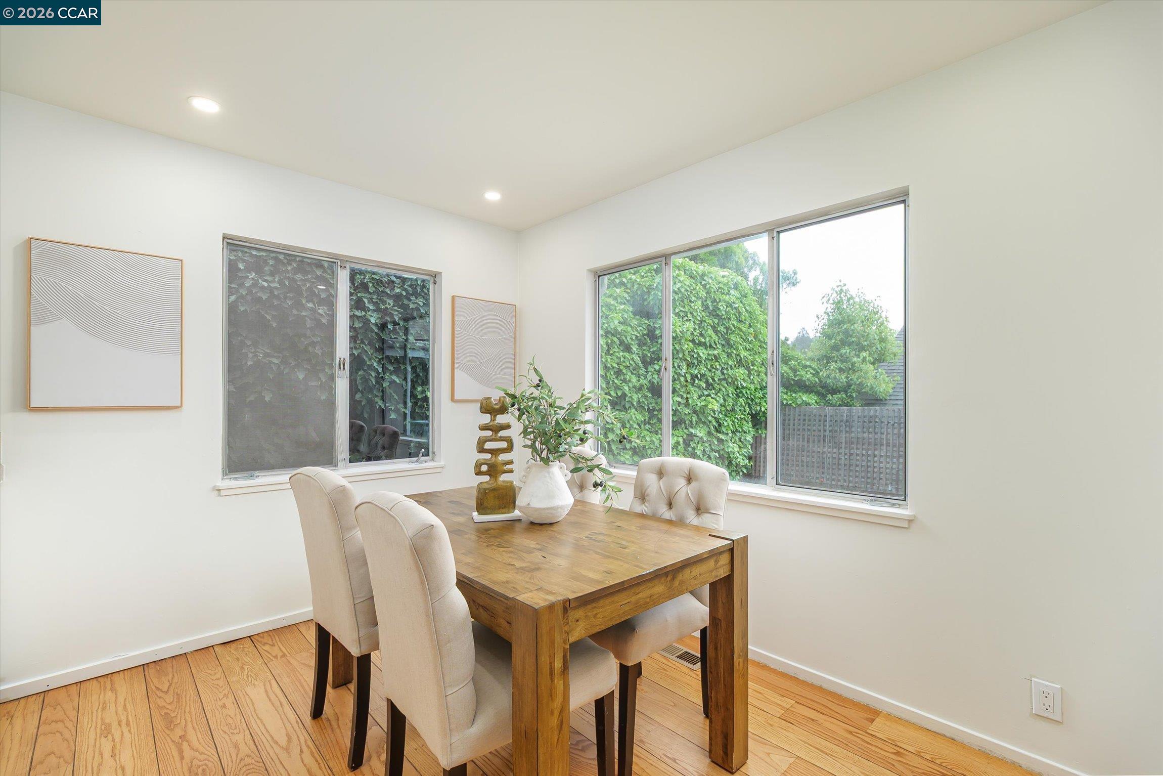 315 Forbes Avenue San Rafael, CA 94901 - Photo 8 of 28 a view of a dining room with furniture and wooden floor