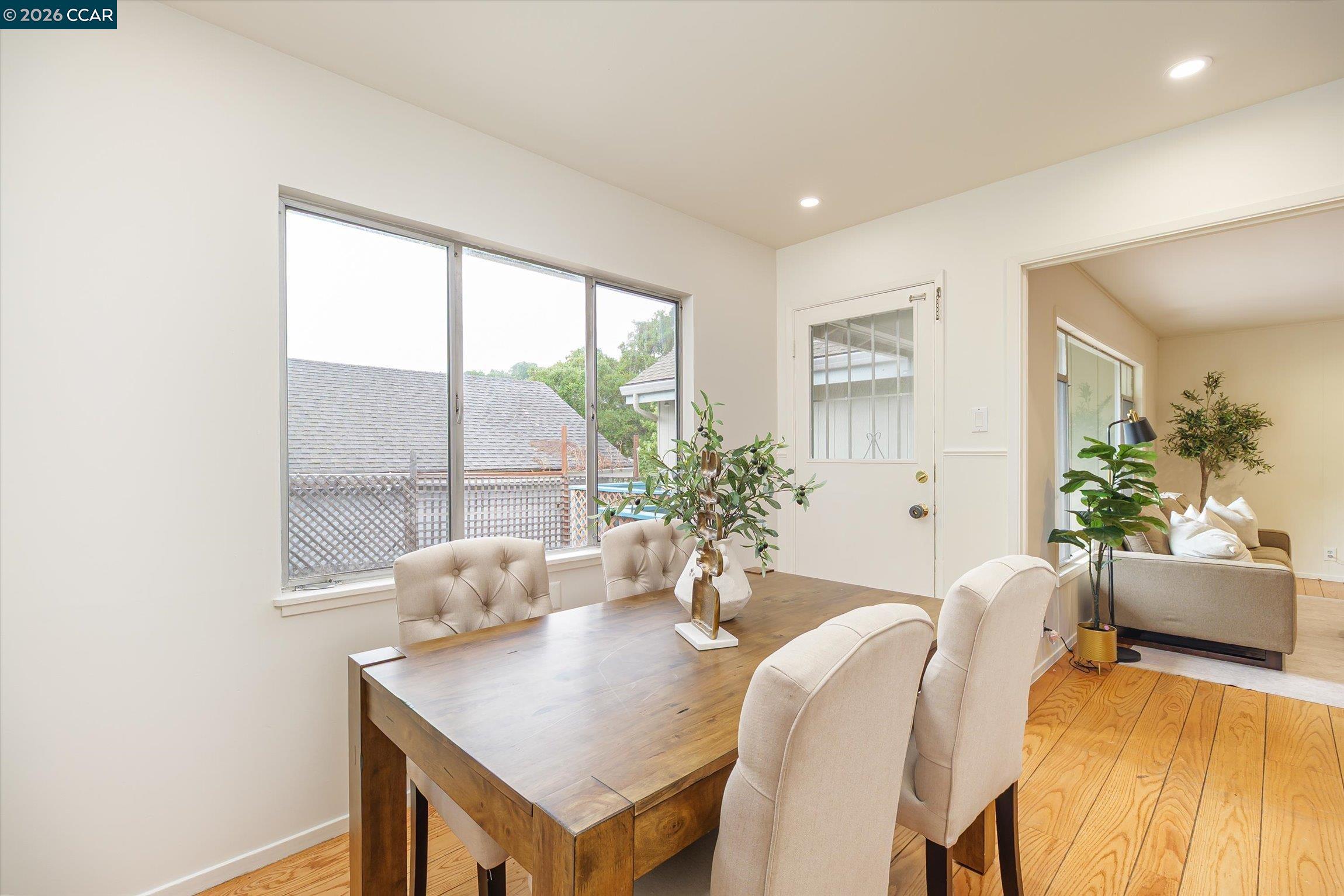 315 Forbes Avenue San Rafael, CA 94901 - Photo 9 of 28 a view of a dining room with furniture and a potted plant