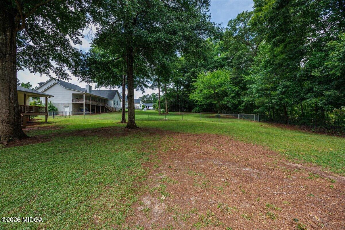 557 Aarons Circle Gray, GA 31032 - Photo 36 of 36 a view of a house with a yard