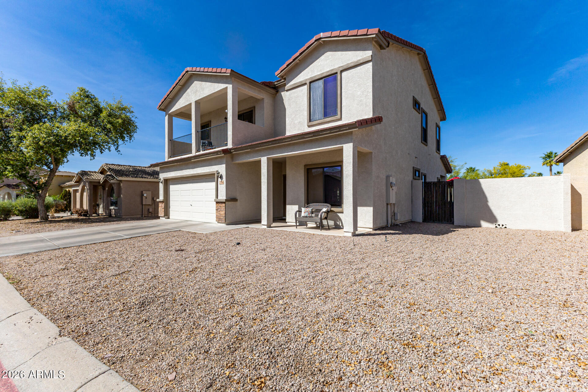 2756 South Powell Road Apache Junction, AZ 85119 - Photo 35 of 37 a front view of a house with a yard