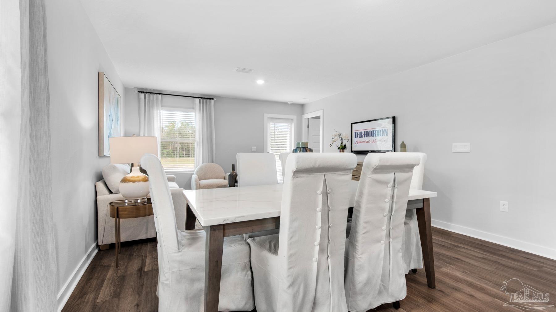 8 Spoonbill Street Cantonment, FL 32533 - Photo 11 of 38 a view of a kitchen with furniture and wooden floor