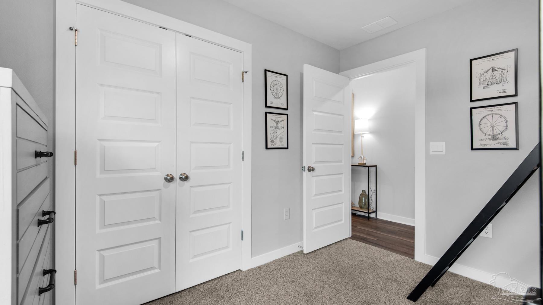 8 Spoonbill Street Cantonment, FL 32533 - Photo 27 of 38 a view of a hallway with closet area