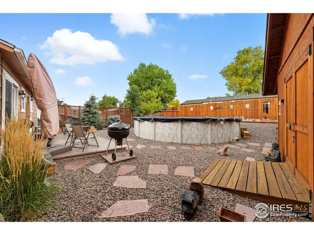 a view of swimming pool outdoor seating