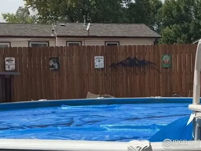 a view of a living room with a window