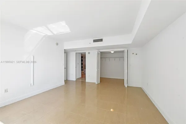 an empty room with a natural light