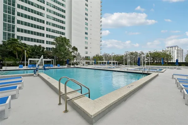 a view of a swimming pool and a buildings