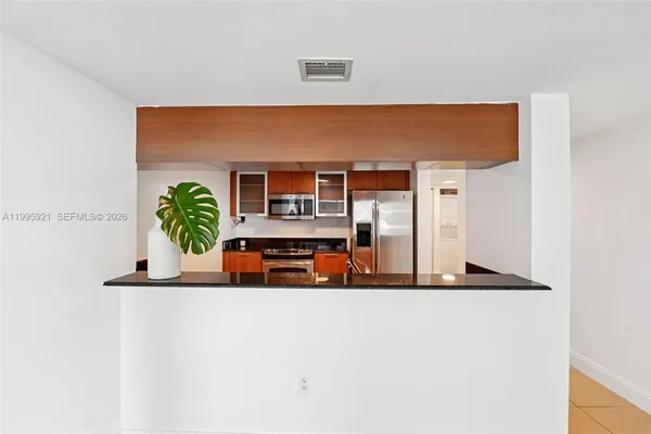 a view of a living room with furniture