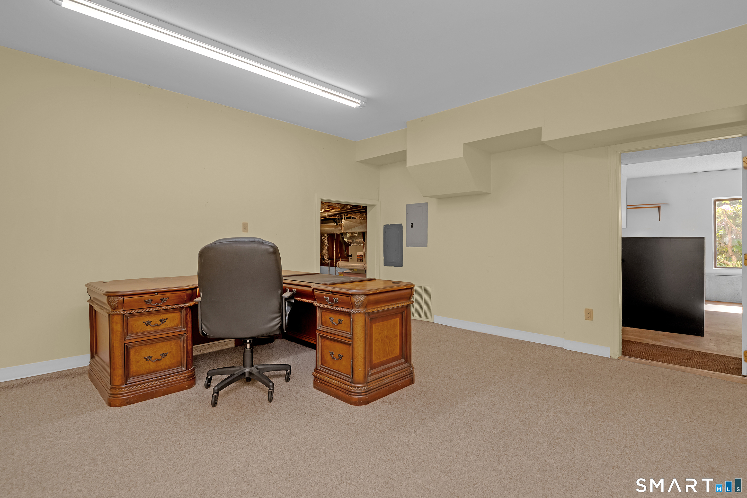 90 Bell Street Manchester, CT 06040 - Photo 28 of 40 a view of a workspace with furniture