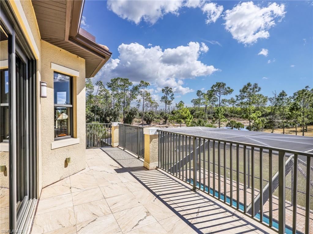 3160 27th Avenue Southwest Naples, FL 34117 - Photo 9 of 43 a view of a balcony with wooden floor