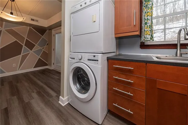 a utility room with dryer and washer
