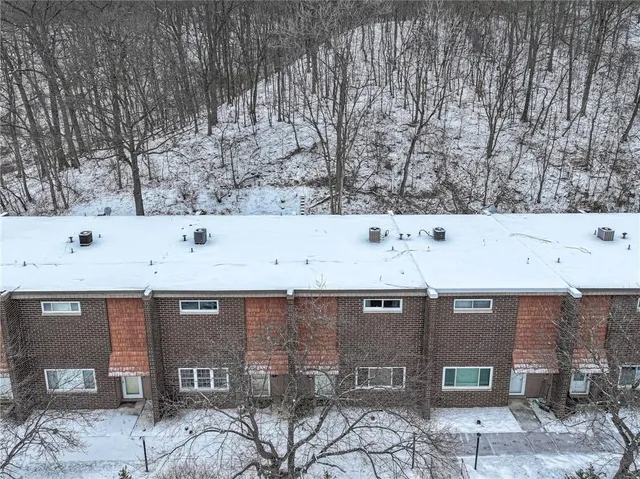 a view of a building with a yard