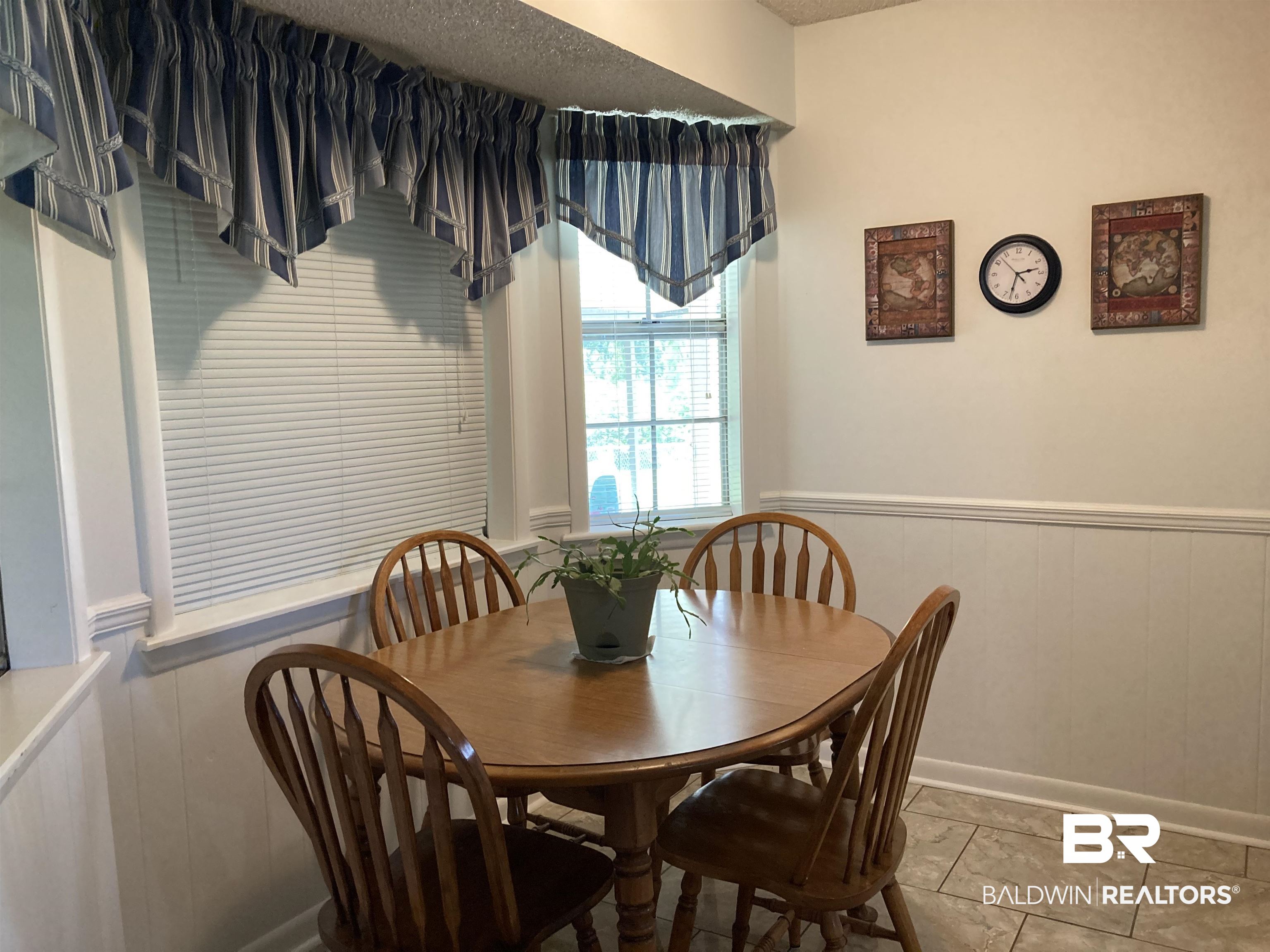 6151 Meadows Road Walnut Hill, FL 32568 - Photo 3 of 29 Dining area with a textured ceiling and tile patterned floors