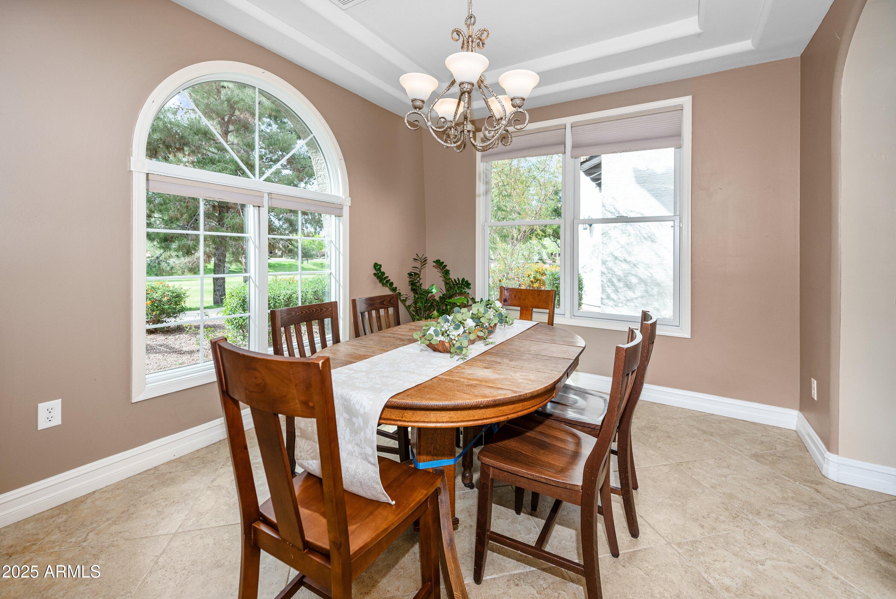 964 South Henry Lane Gilbert, AZ 85296 - Photo 12 of 48 a view of a dining room with furniture window and outside view