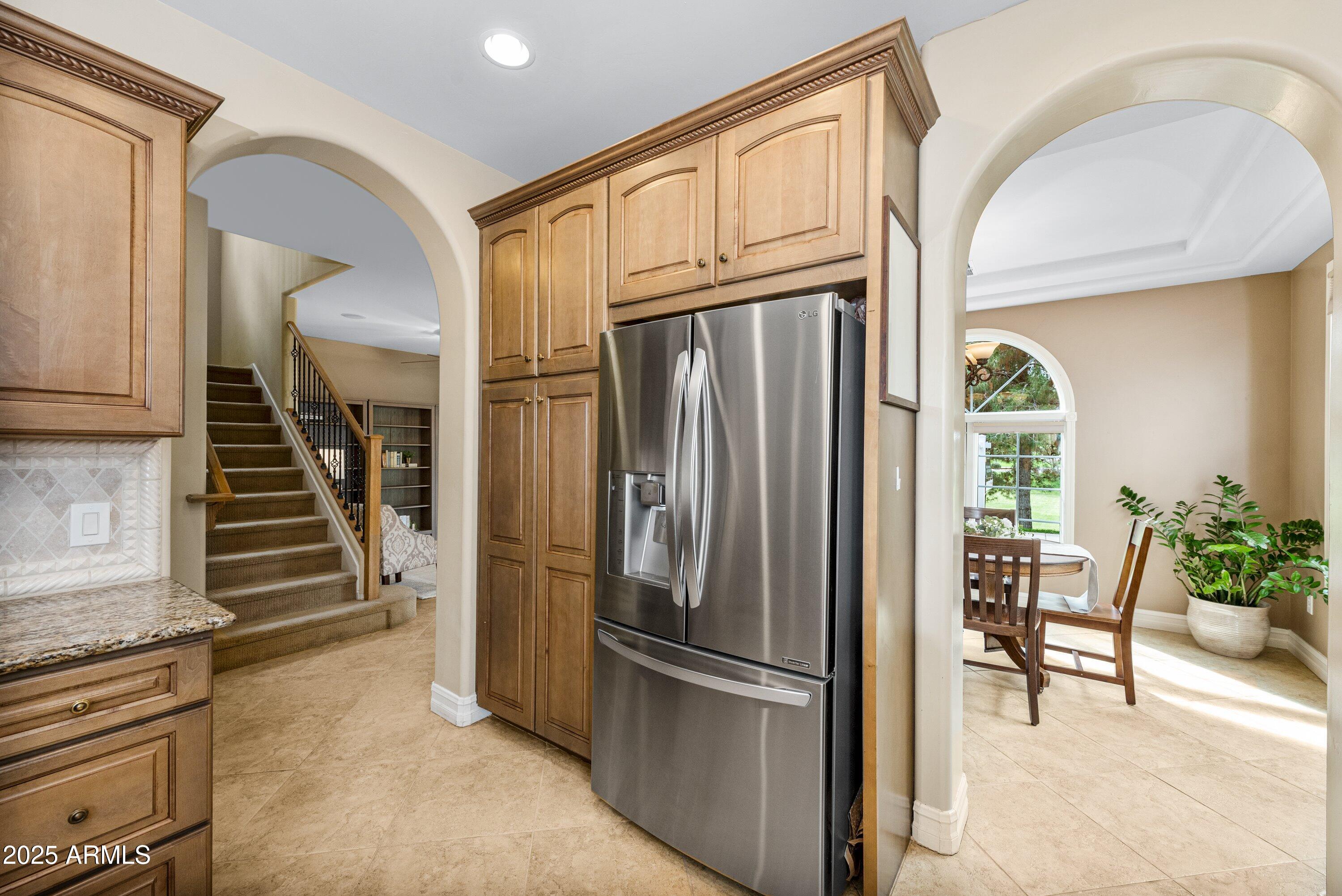 964 South Henry Lane Gilbert, AZ 85296 - Photo 14 of 48 a view of kitchen with furniture and staircase