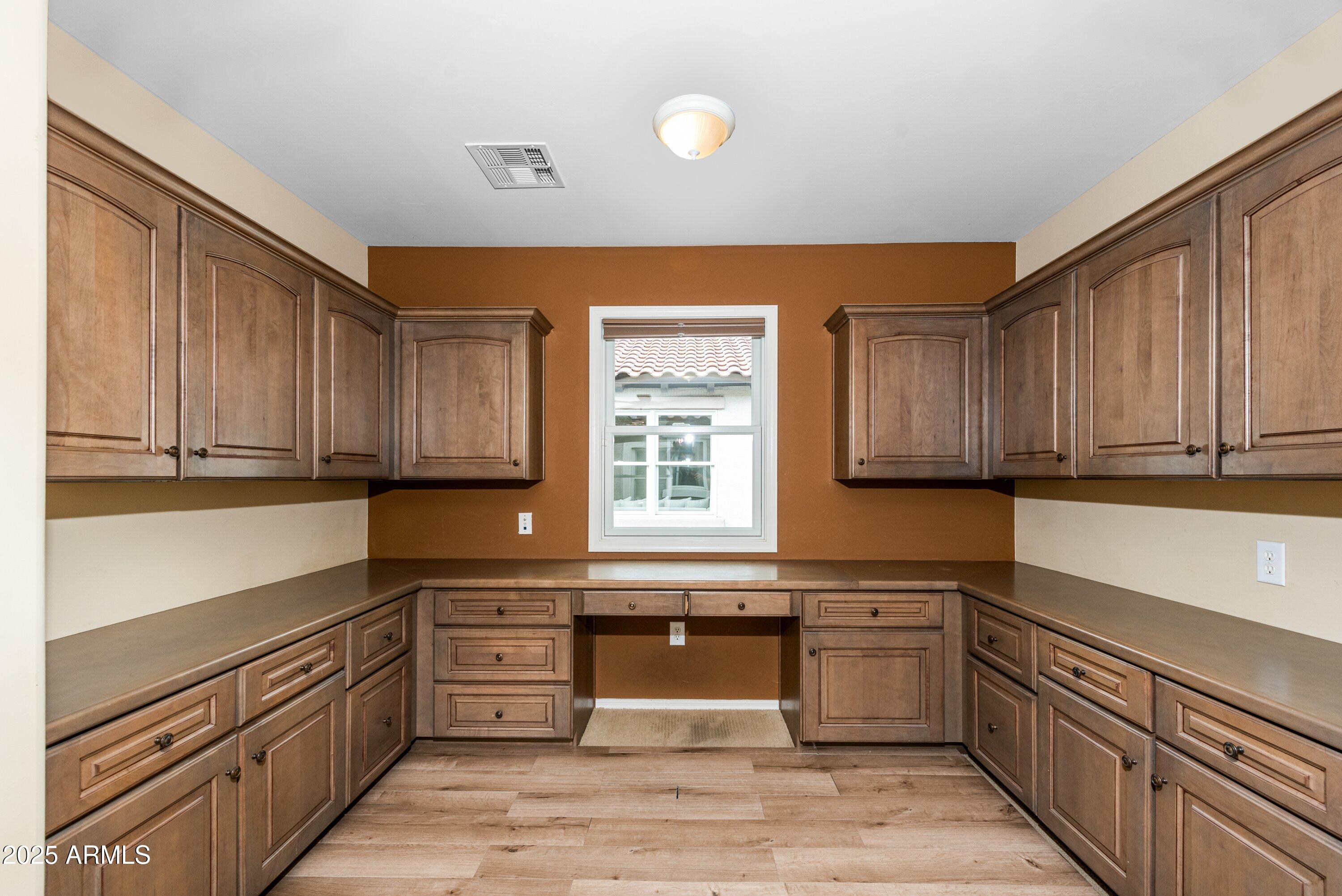 964 South Henry Lane Gilbert, AZ 85296 - Photo 21 of 48 a kitchen with stainless steel appliances granite countertop a stove a sink and a microwave
