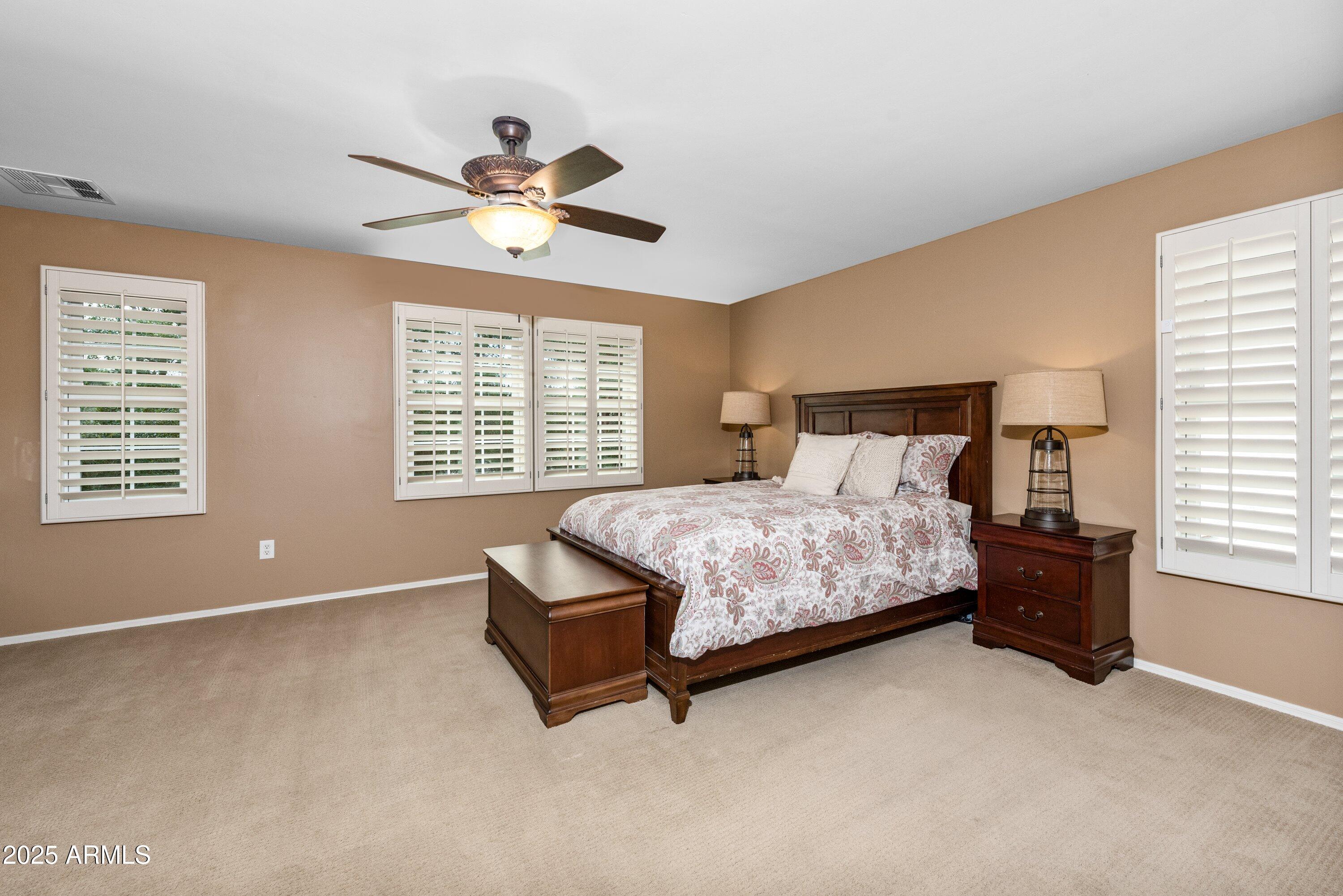 964 South Henry Lane Gilbert, AZ 85296 - Photo 22 of 48 a bedroom with a bed and window