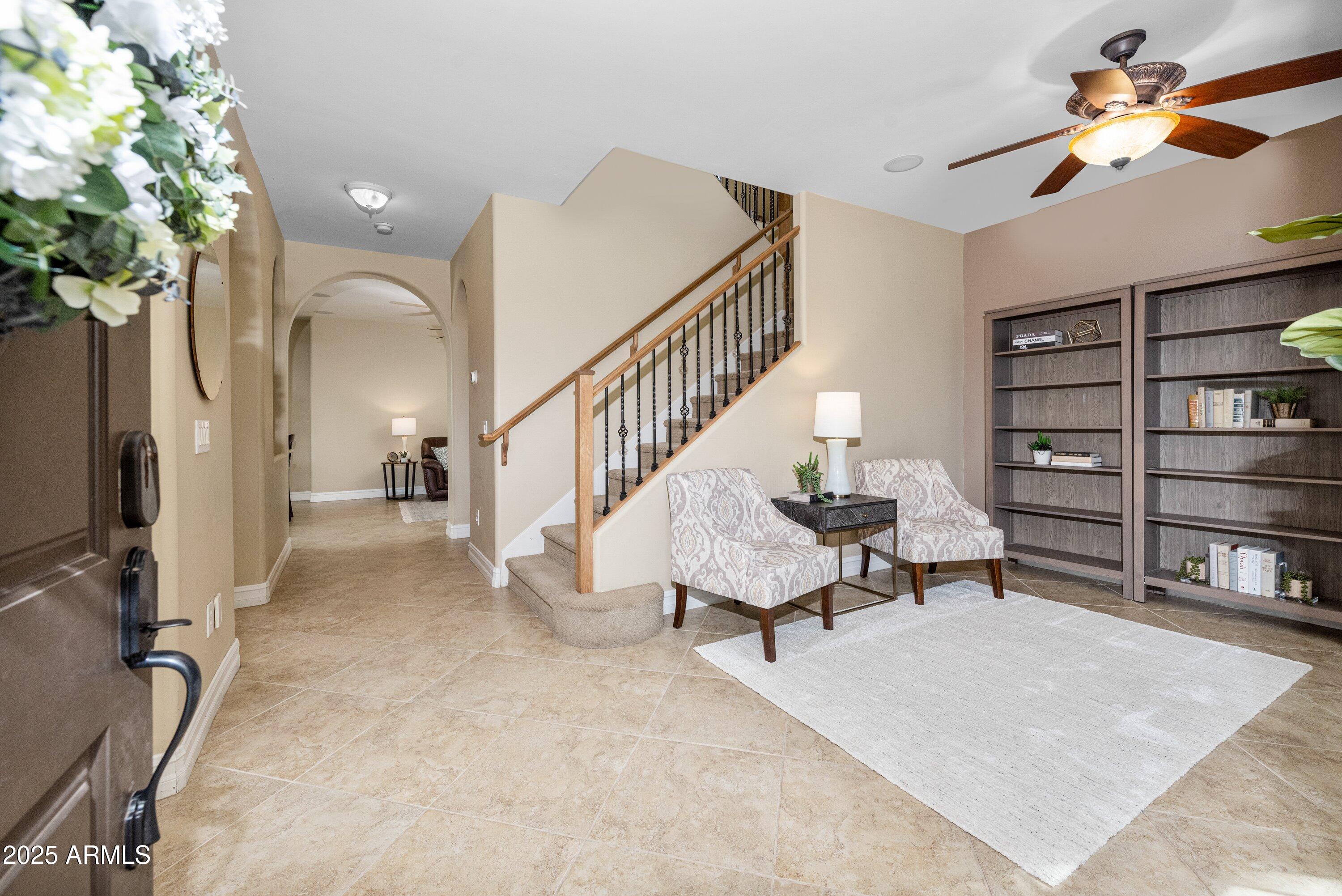 964 South Henry Lane Gilbert, AZ 85296 - Photo 9 of 48 a view of a livingroom with furniture and staircase
