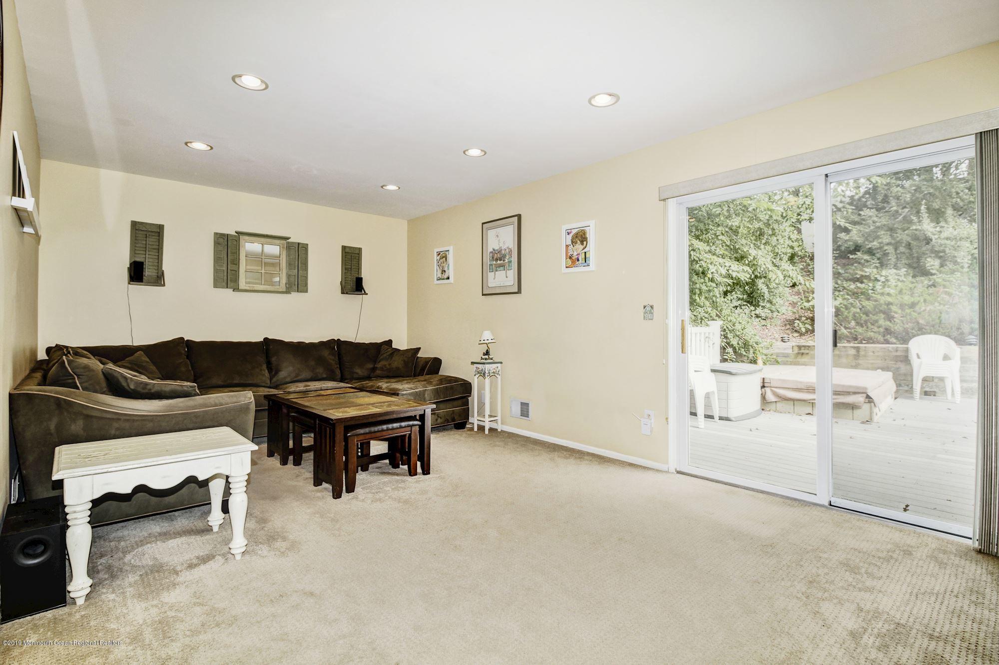 5 Heather Drive Howell, NJ 07731 - Photo 14 of 34 a living room with furniture and large window