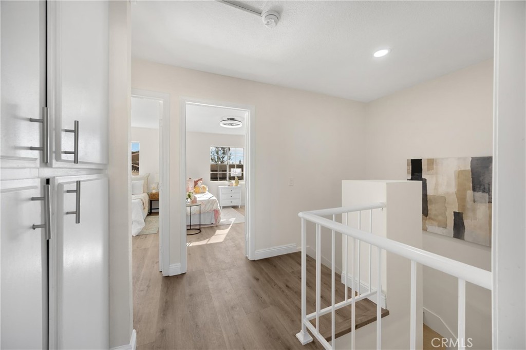 7268 Hermosa Avenue Rancho Cucamonga, CA 91701 - Photo 24 of 50 a view of livingroom with furniture and wooden floor