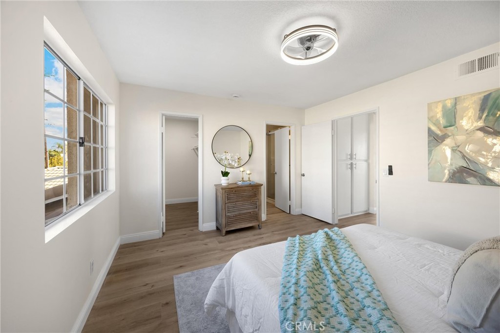 7268 Hermosa Avenue Rancho Cucamonga, CA 91701 - Photo 30 of 50 a bedroom with a bed and a window
